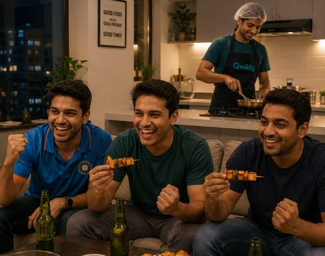 Flatmates enjoying home-cooked snacks while a Qwikly chef cooks