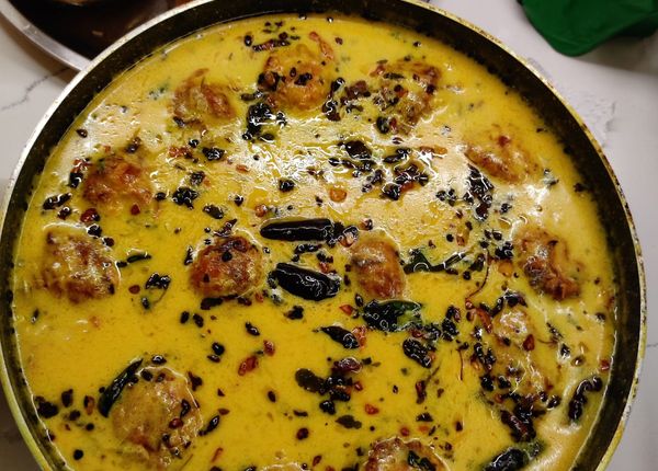 Kadhi Pakoda cooked fresh by a Qwikly chef